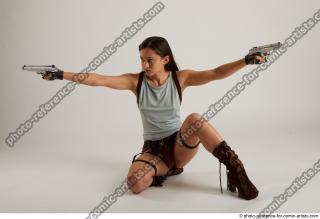 15 Shrima Kneeling Pose With Guns